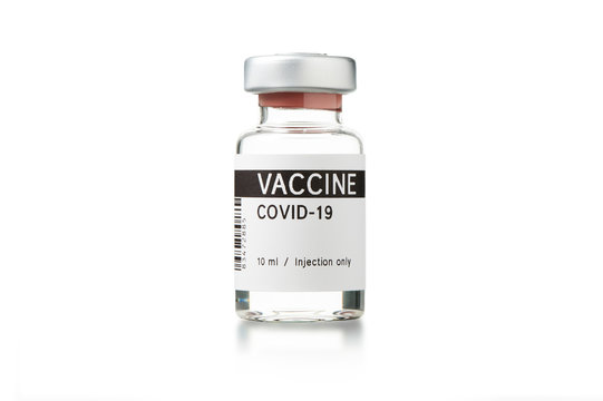 Glass ampoule with the inscription COVID-19 VACCINE isolated on a white background.