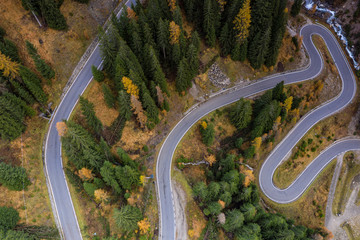 Aerial of a winding road in the Dolomites