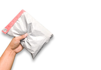 An envelope in the human hand Separate on an intimate white background. High resolution products