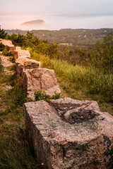 View from hill and stone block