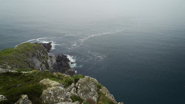 Calm seas off Irish cliffs