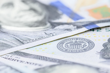 US 100 dollar banknotes on a table