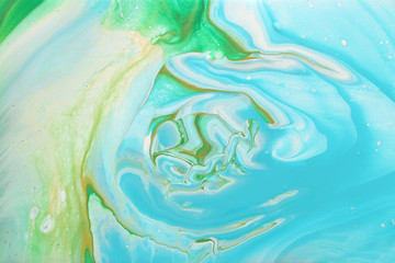 Fototapeta na wymiar art photography of abstract marbleized effect background. Mint, green, blue and white creative colors. Beautiful paint
