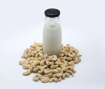 cashew nut milk in bottle on isolated background