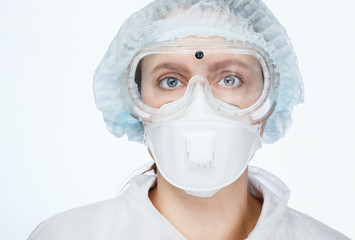 Young female doctor wearing protective suit portrait