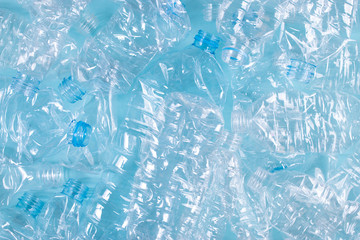 Top view of blue plastic bottles background. Recycle and World Environment Day