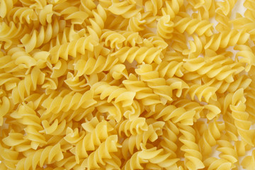 Spiral pasta.Fusilli spaghetti pattern background. Fusilli background.
