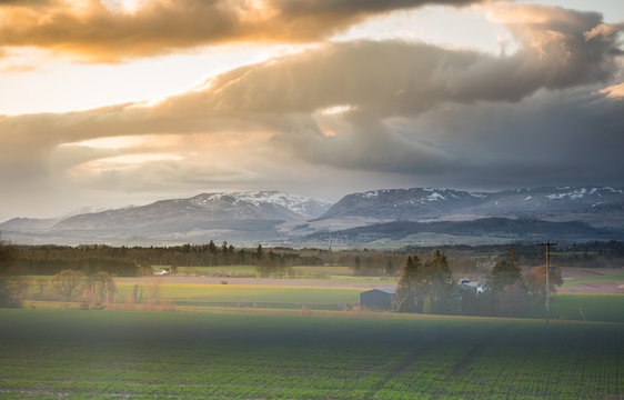 Stormy sky over Crieff in Perth and Kinross, Scotland. Beautiful Scottish countryside landscape in foreground.