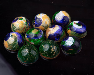 chocolate candies on black stone