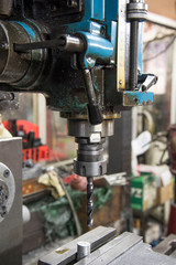 CNC drilling and milling in a workshop