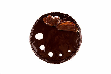 Chocolate cake with chocolate glaze on white background