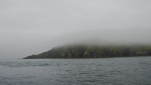 Mist hanging over an island