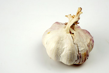 Fresh garlic, isolated on a white background.