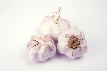 Fresh garlic, isolated on a white background.