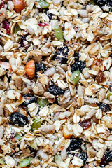 Top view close up muesli, abstract cereal grain pattern, granola texture as background