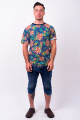 Obraz premium Full body shot of young handsome tourist man