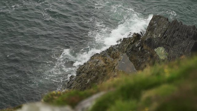 waves crashing on rocks