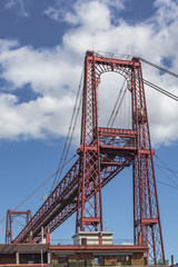 Transporter bridge over the Nervion river. Landmark of Portuguese city. Massive construction through the water. Traveling in Spain. Biscay Bridge between Portugalete and Getcho.