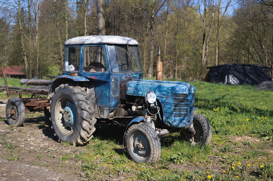Bukovec, Czech Republic / Czechia - May 1, 2017 - Zetor, old, retro, vintage and aged tractor. Vehicle for worn on farm and field. Rustic macine in rural area.