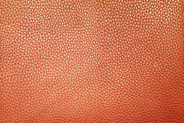 Brown genuine leather texture with space for lettering. Close up.