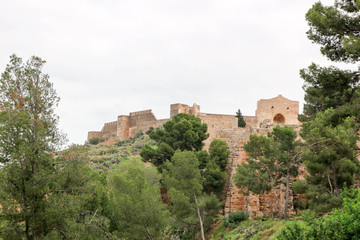 View from below to beautiful ruins of the medieval Sagunto castle in Spain