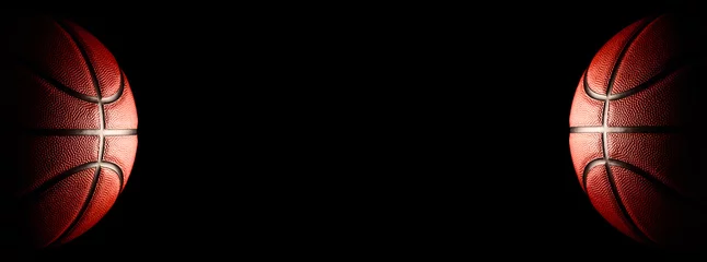 Foto op Plexiglas Basketball on a black background. panoramic background or basketball with blank space © 168 STUDIO
