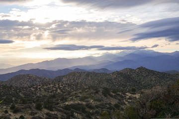 Desert Mountain Range with Cloudy Sky