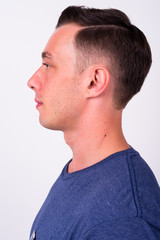 Obraz premium Closeup profile view of young handsome man