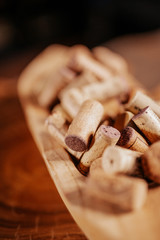 Bottle corks on a wooden background. Close up.