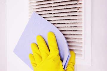 A layer of dust on the ventilation grill in the bathroom. To clean ventilation at home.