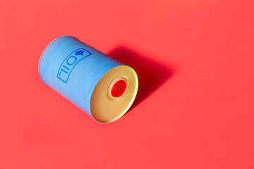 Metal barrel of oil with text 