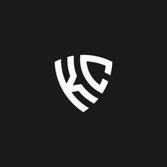 KC monogram logo with shield shape