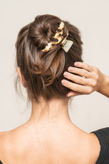 Naklejka premium Model With Hair Clips