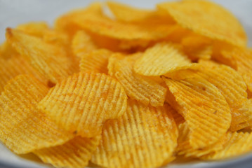 Potato chips on the dish are very to eat. 