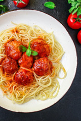 pasta spaghetti meatballs tomato sauce, main course Menu concept, food background, diet. top view. copy space for text
