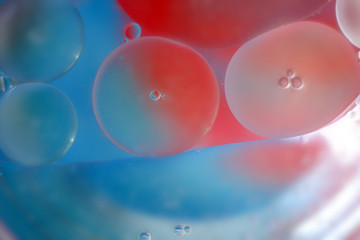 abstract background with bubbles oil drops on the water surface