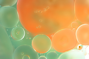 abstract background with bubbles oil drops on the water surface