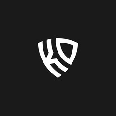 KD monogram logo with shield shape