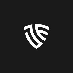 JE monogram logo with shield shape