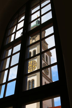 Perlach tower through window of the City Hall in Augsburg, Germany