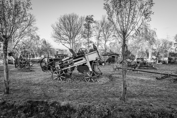 Fototapeta na wymiar old farming equipment in black and white