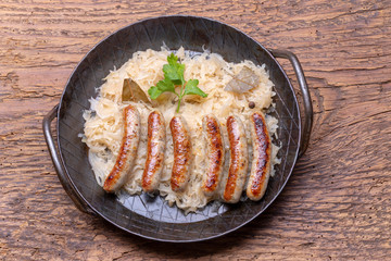 grilled nuremberger bratwurst with sauerkraut