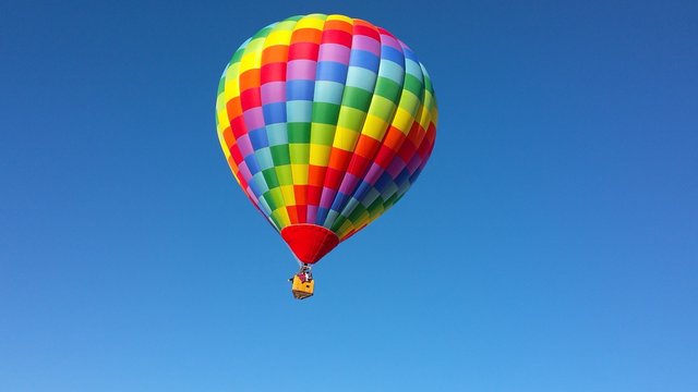 Low Angle View Of Hot Air Balloon Against Clear Blue Sky