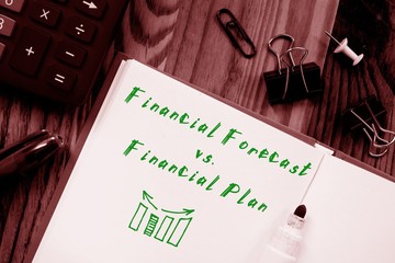 Financial Plan vs. Financial Forecast Written on Note