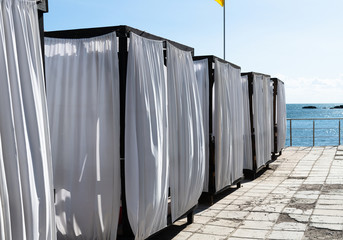 The Beach arbors closed with a white cloth, Crimea