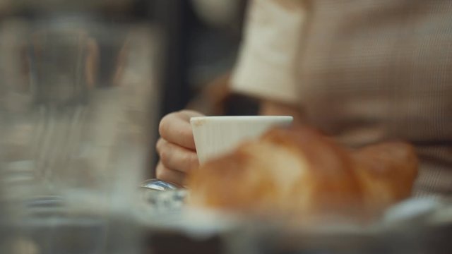 Young girl having breakfast close-up