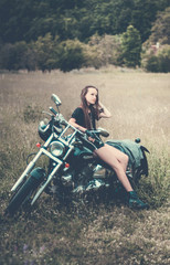 Fototapeta na wymiar young girl on a bike