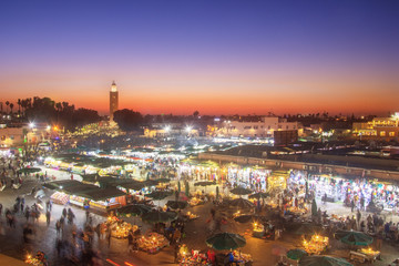 Fototapeta na wymiar Jamaa el Fna market square with Koutoubia mosque, Marrakesh, Morocco, north Africa 