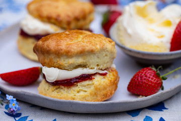 Freshly baked home made scones with strawbery jam and clotted cream