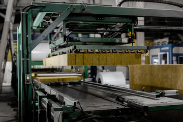 production of building panels with insulation